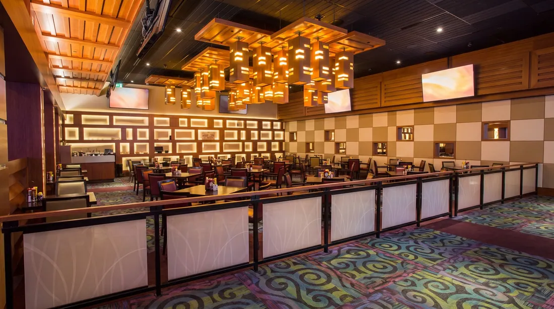 Restaurant tables beside the Club Regent gaming floor