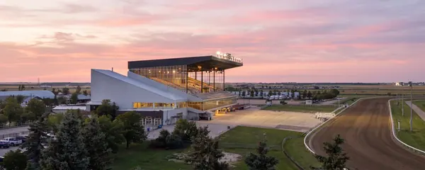 Assiniboia Downs grandstand at dusk